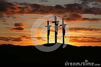 Three crosses over bright sunset with copy space Stock Photo